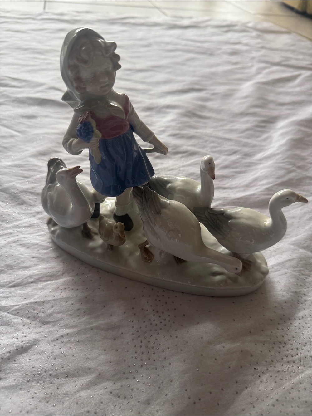 Porcelain Girl with Geese Figurine - Blue and White( missing the flowers)